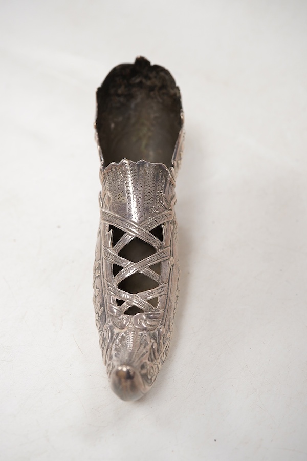 An early 20th century Hanau large novelty silver pin cushion(lacking cushion), modelled as a lady's shoe, import marks for Berthold Muller, Chester, 1907, 15.5cm, 4.8oz.